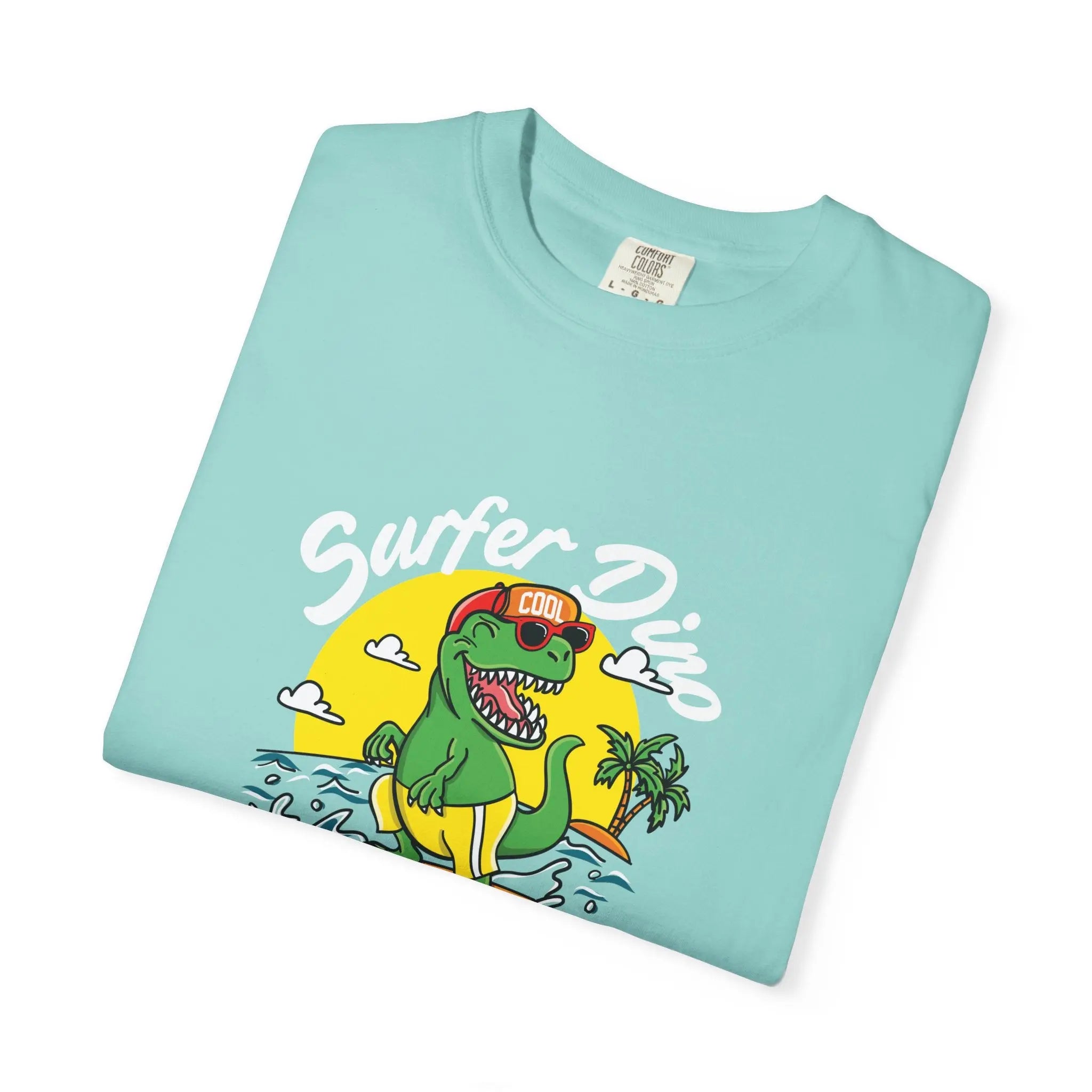 California Dream Surfing Dinosaur In Waves With Palm Tree Graphic T-Shirt - Sinful Threads