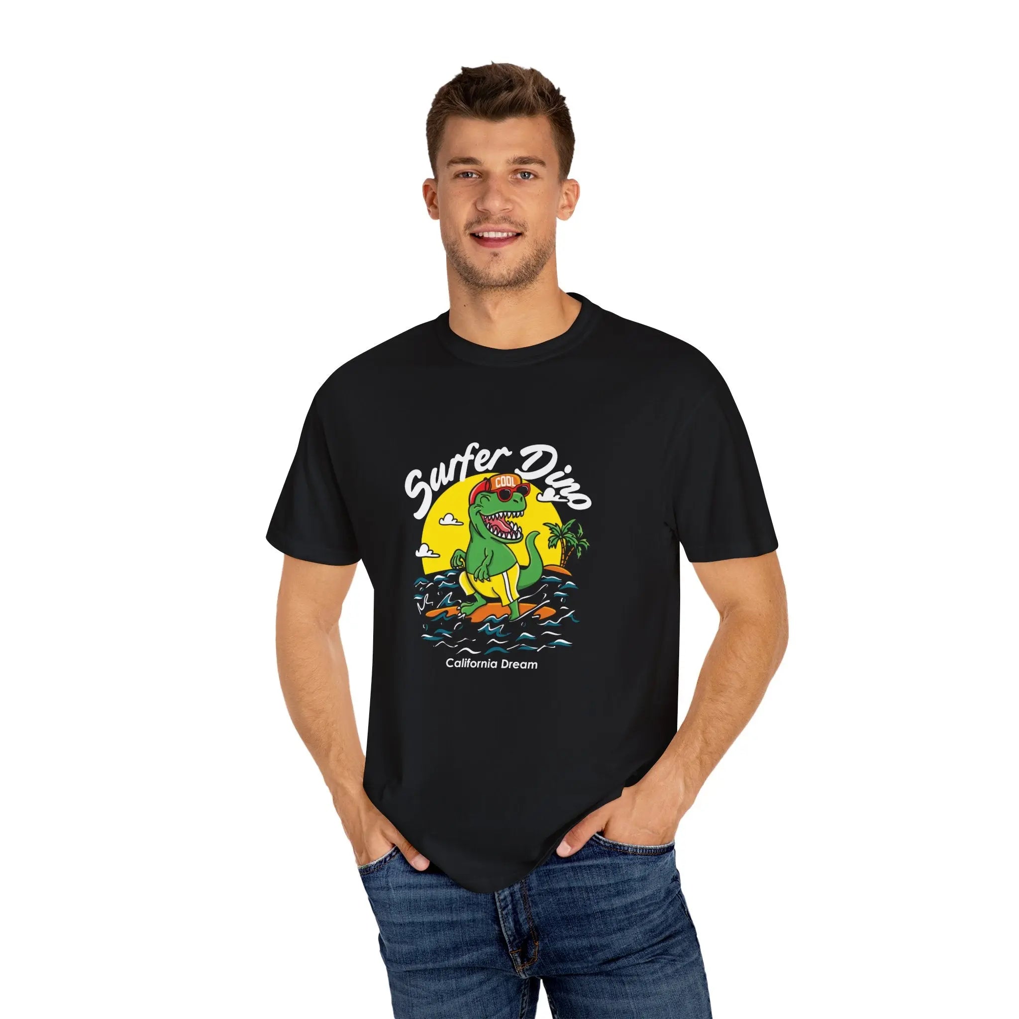California Dream Surfing Dinosaur In Waves With Palm Tree Graphic T-Shirt - Sinful Threads
