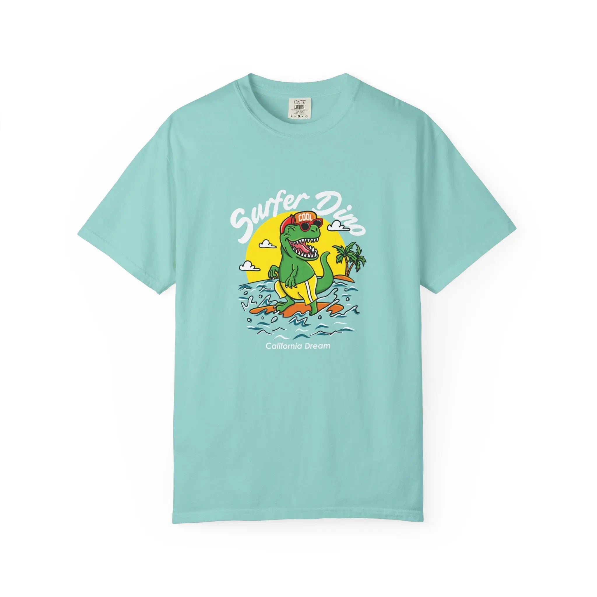 California Dream Surfing Dinosaur In Waves With Palm Tree Graphic T-Shirt - Sinful Threads
