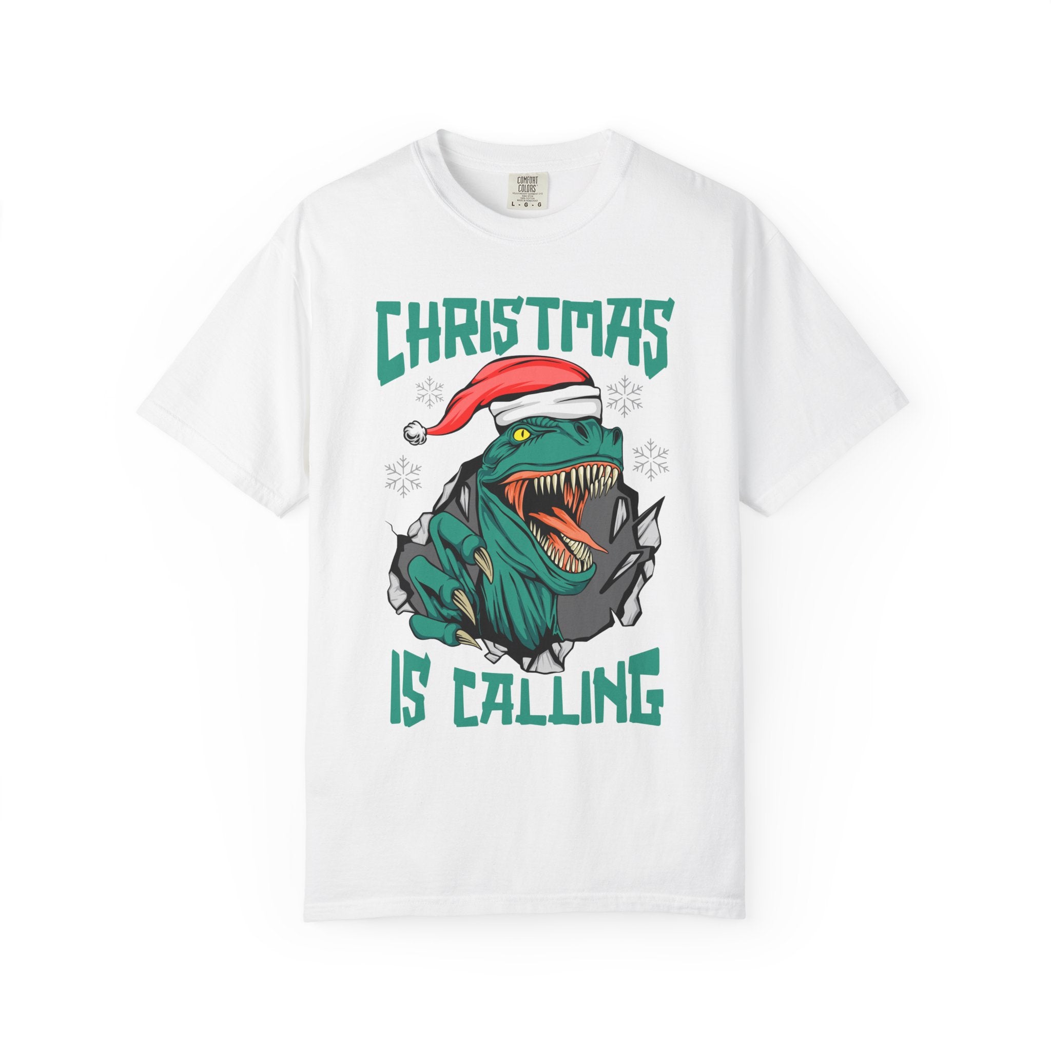 White t-shirt with a dinosaur wearing a Santa hat and 'Christmas is Calling' text on a white background