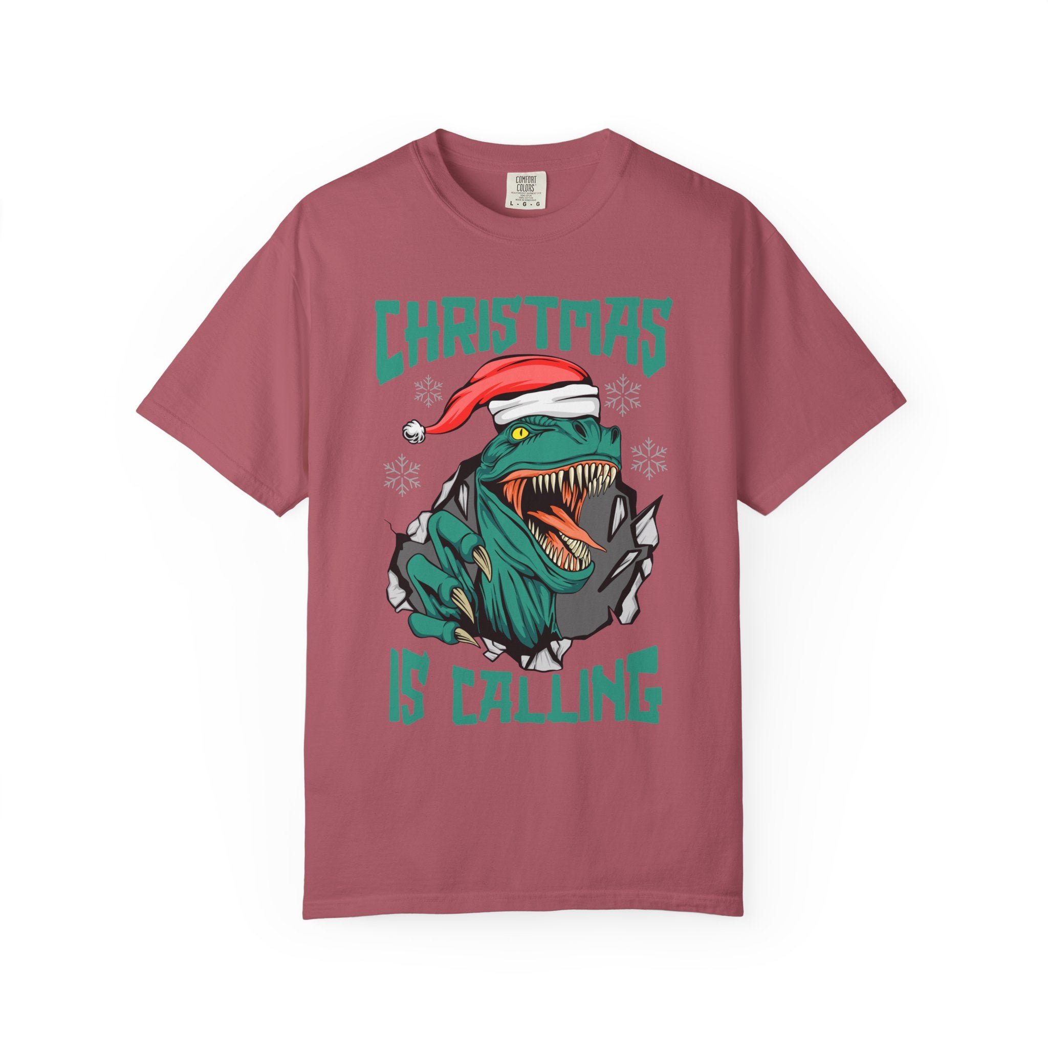 T-shirt with a dinosaur wearing a Santa hat and 'Christmas is Calling' text on a white background