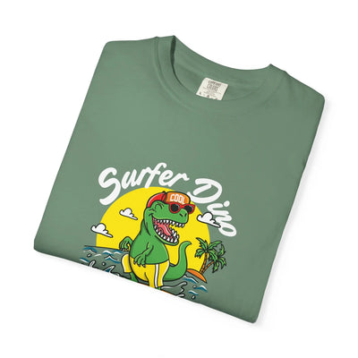 California Dream Surfing Dinosaur In Waves With Palm Tree Graphic T-Shirt - Sinful Threads