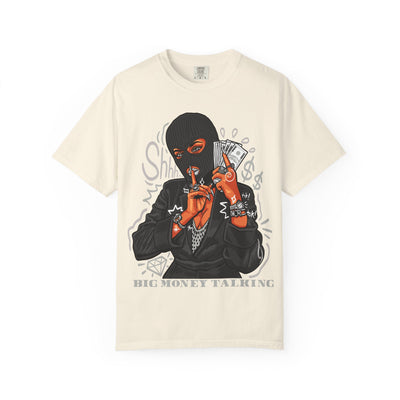 Beige t-shirt with graphic design of a person in a black mask holding money on a white background