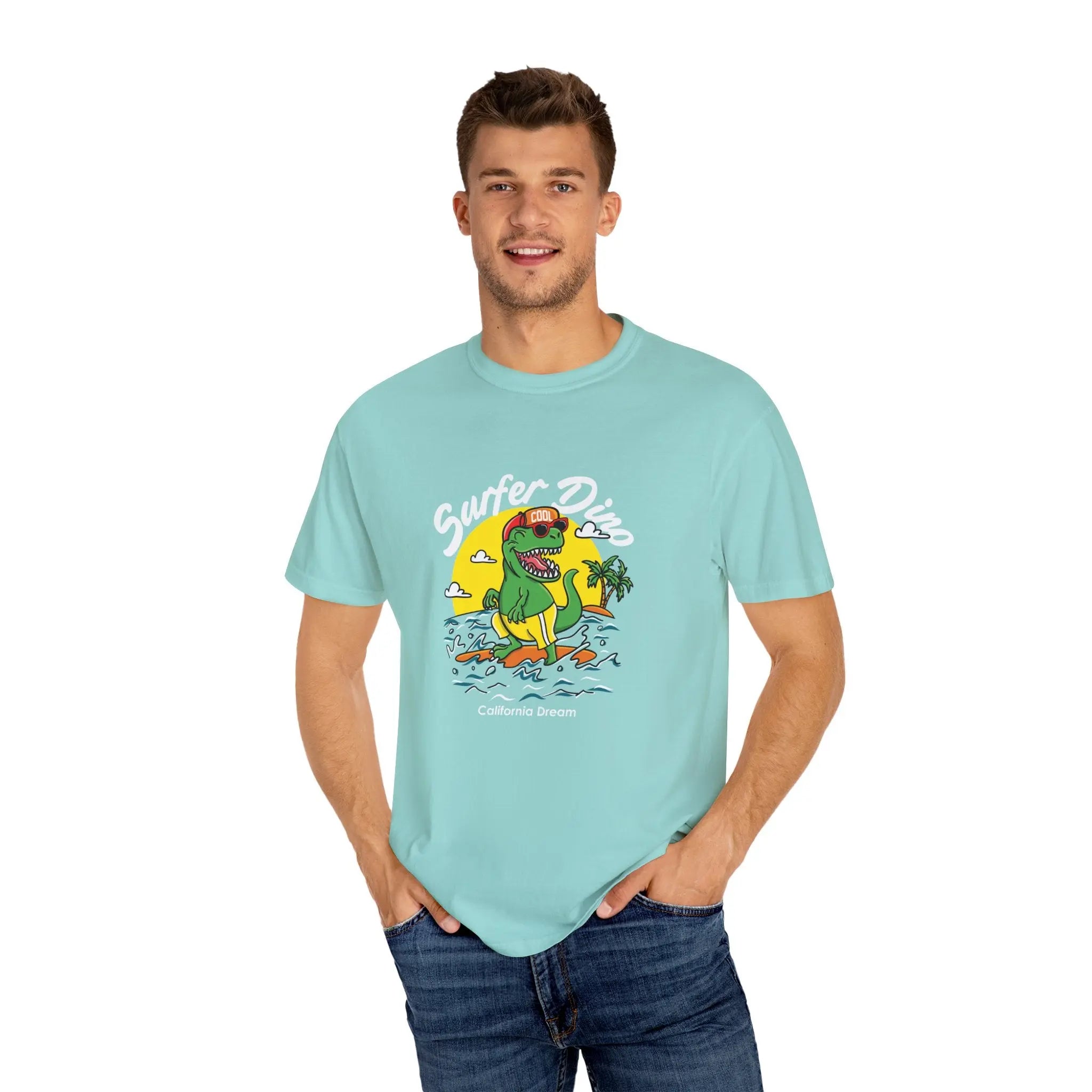 California Dream Surfing Dinosaur In Waves With Palm Tree Graphic T-Shirt - Sinful Threads
