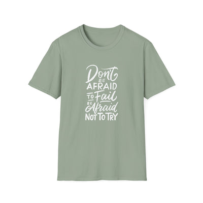 Sage green t-shirt with motivational quote on a white background