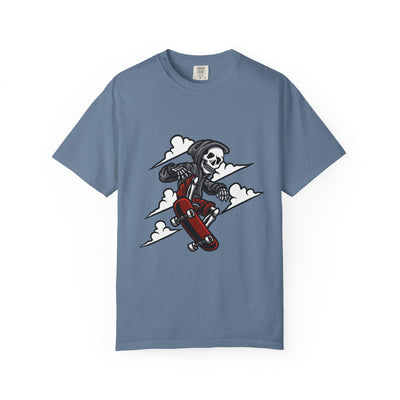 Blue t-shirt with a graphic of a skeleton on a skateboard against a white background